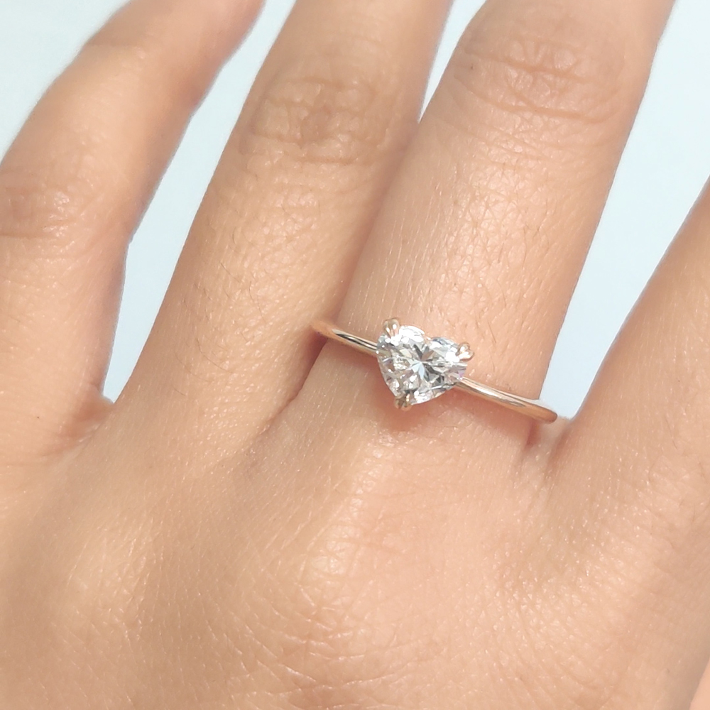 Heart deals solitaire ring